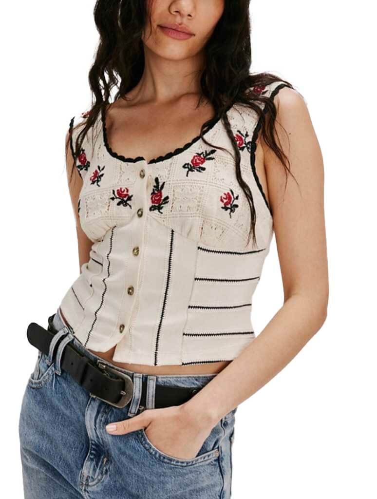 Free People Rose Bud Knit Top featuring delicate rose embroidery and button closure, perfect for summer and fall layering.