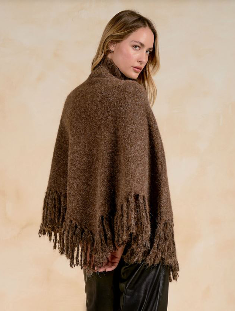 Turtleneck Poncho With Fringe Hem